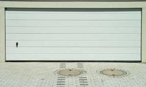 Pose de portes de garage basculante ou portes sectionnelles Rhone